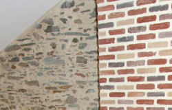 De rustieke bakstenen muur